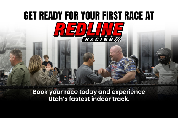 Group of new racers celebrating after indoor go-karting at Redline Racing Utah.